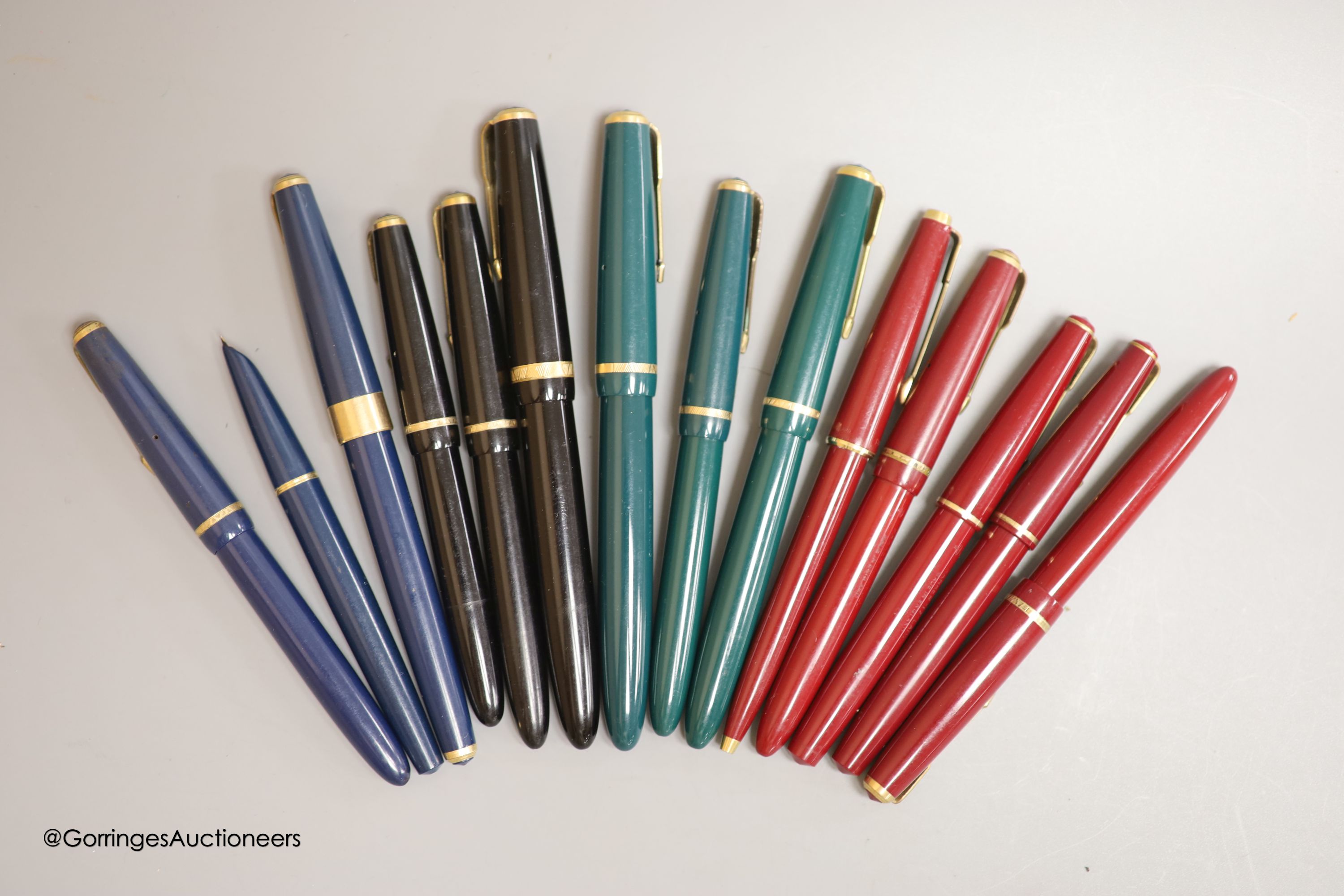 Fourteen Parker pens including Maxima